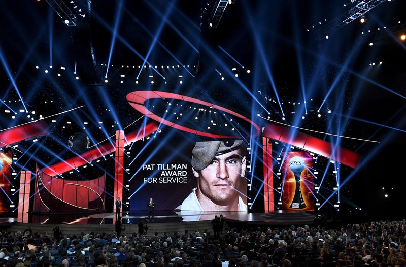 U.S. Air Force Technical Sgt. Israel Del Toro (R) accepts the Pat Tillman Award for Service from TV personality Jon Stewart onstage at The 2017 ESPYS at Microsoft Theater on July 12, 2017 in Los Angeles, California. 
