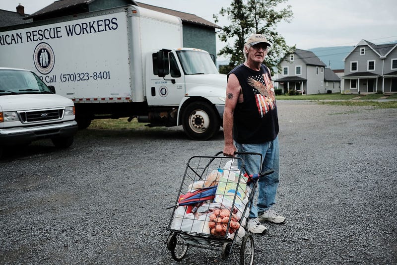 A man walks away from a food pantry operated by the American Rescue Workers in the struggling city of Williamsport, which has recently seen an epidemic of opioid use among its population on July 13, 2017 in Williamsport, Pennsylvania.