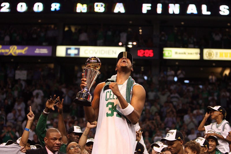 Paul Pierce #34 of the Boston Celtics celebrates with the NBA Finals MVP trophy after defeating the Los Angeles Lakers in Game Six of the 2008 NBA Finals on June 17, 2008 at TD Banknorth Garden in Boston, Massachusetts.