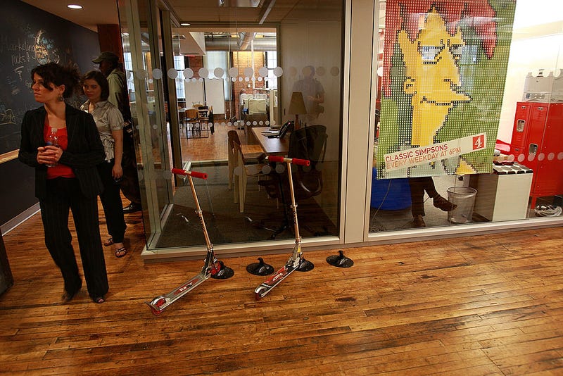  Scooters sit in a hallway for use by employees for Google at the internet company's new office space inside historic Chelsea Market June 23, 2008 in New York City. The new space, which is across the street from the older Google office, will house around 300 employees bringing the total number of Google employees in New York City to around 1,500. (Photo by Spencer Platt/Getty Images)