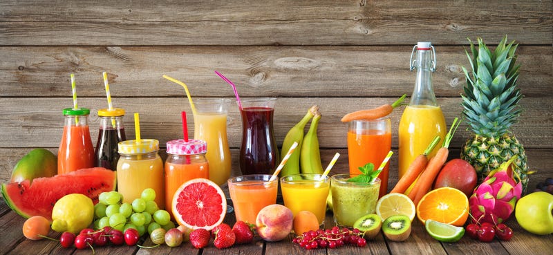 Various freshly squeezed fruits and vegetables juices