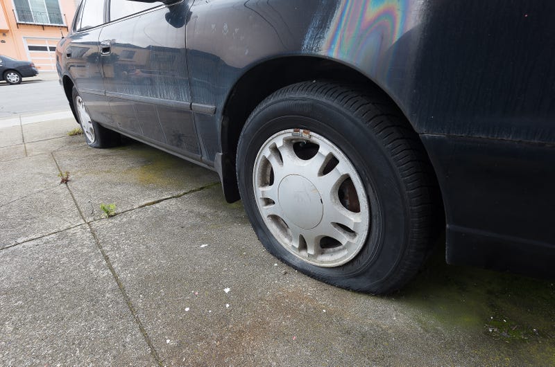 A 28-year-old Newark man was arrested Friday for slashing tires on reportedly as many as 30 cars in two overnight sprees.