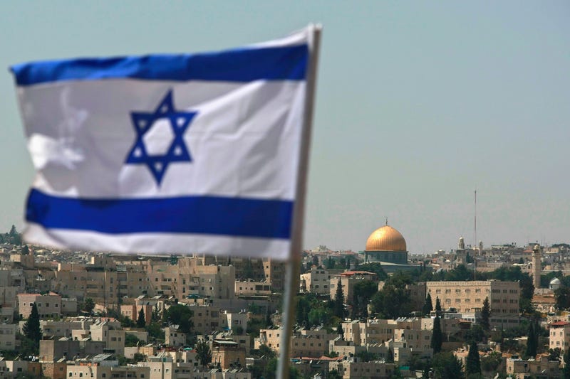Israeli flag above city