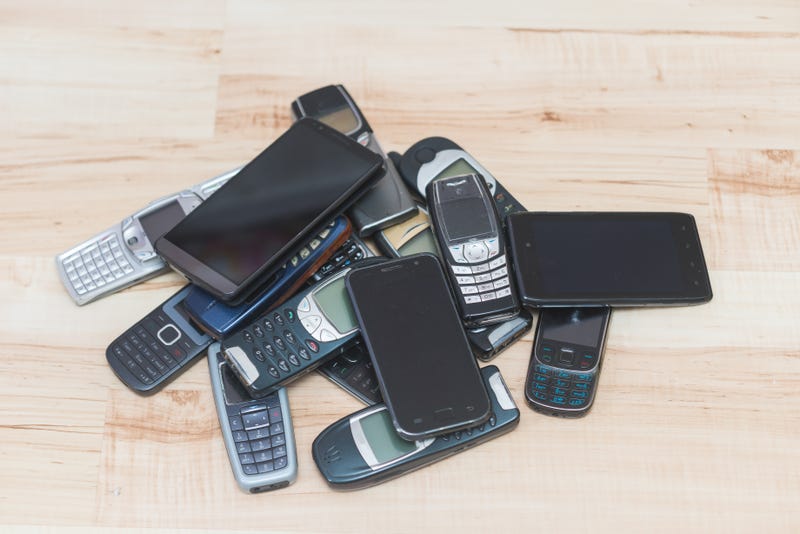 Pile of old cellphones