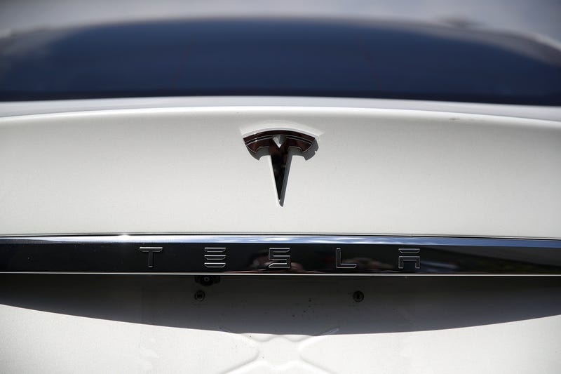 CORTE MADERA, CA - AUGUST 02: The Tesla logo appears on a brand new Tesla Model S on August 2, 2017 in Corte Madera, California. Tesla will report second-quarter earnings today after the closing bell.