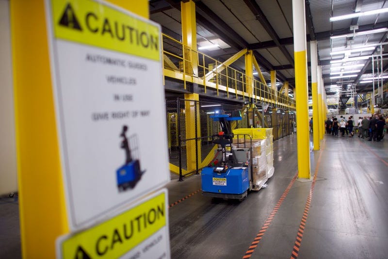 Robotic technology and vision systems work on orders at the Amazon Fulfillment Center on at the Amazon Fulfillment Center on August 2, 2017 in Robbinsville, New Jersey.