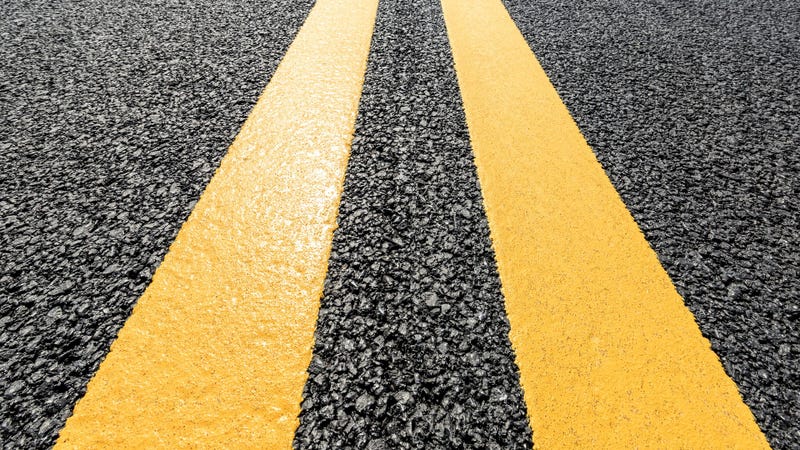 New asphalt road texture background closeup