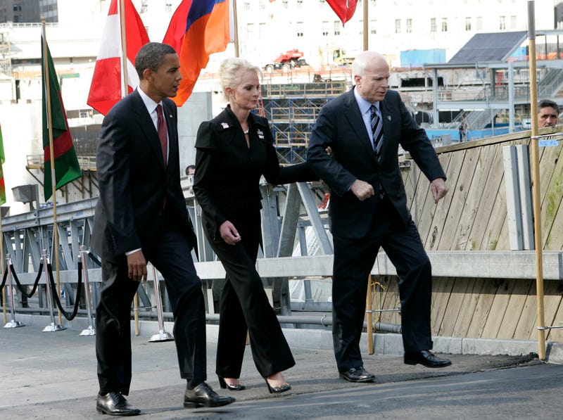 Presidential nominees Barack Obama (L) and Sen. John McCain, and McCain's wife Cindy leave Ground Zero after a memorial on the seventh anniversary of the terrorist attacks on September 11, 2008
