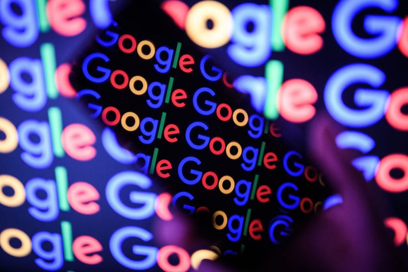 In this photo illustration, The Google logo is displayed on a mobile phone and computer monitor on August 09, 2017 in London, England. Founded in 1995 by Sergey Brin and Larry Page, Google now makes hundreds of products used by billions of people across the globe, from YouTube and Android to Smartbox and Google Search. (Photo by Leon Neal/Getty Images)