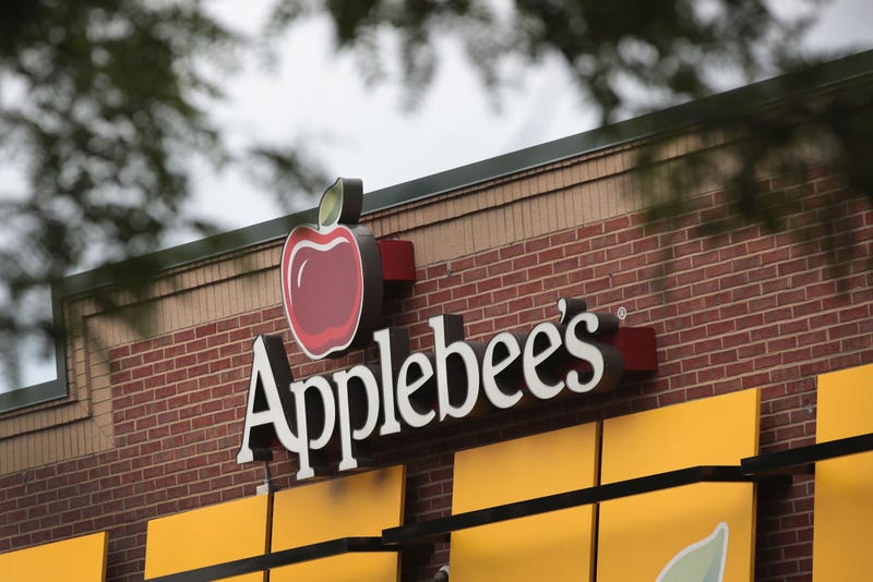 An Applebee's restaurant serves customers on August 10, 2017 in Chicago, Illinois. DineEquity, the parent company of Applebee's and IHOP, plans to close up to 160 restaurants in the first quarter of 2018. 