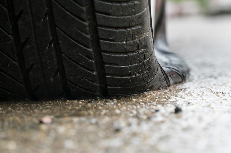 A trio from Brooklyn tried to make a getaway after unknowingly carjacking a woman who needed a flat tire changed.