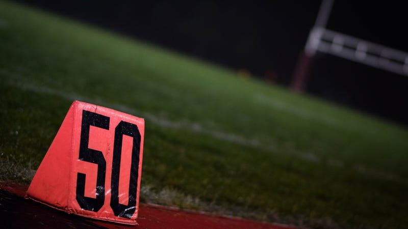 A high school football field.