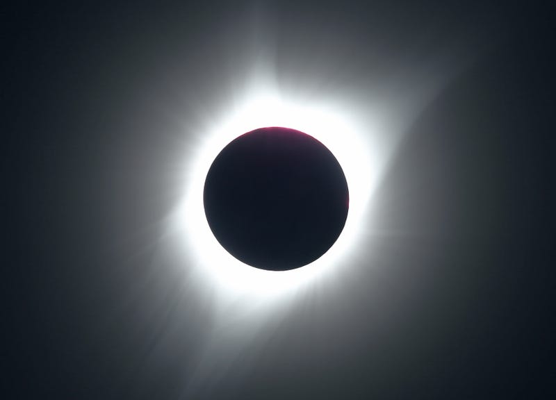 The sun is partially eclipsed in the first phase of a total eclipse in Grand Teton National Park on Aug. 21, 2017, outside Jackson, Wyo.