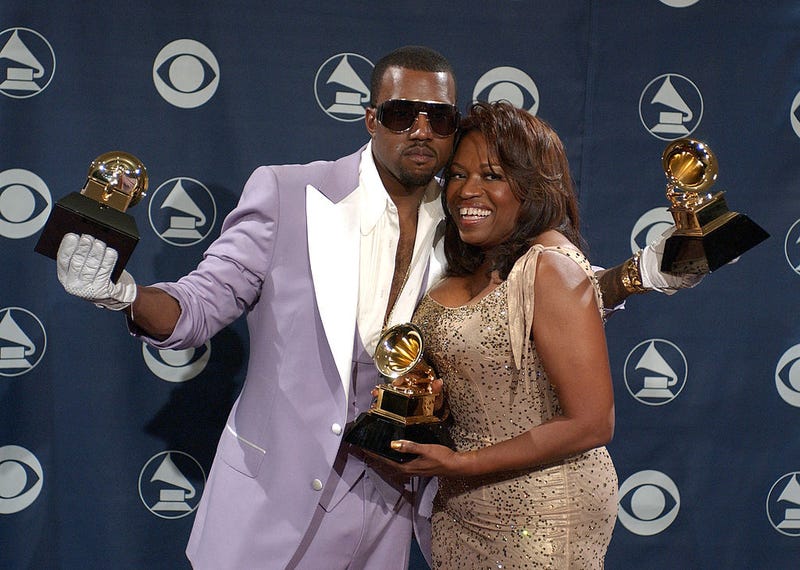 Kanye West, winner of Best Rap Solo Performance for "Gold Digger," Best Rap Song for "Diamonds From Sierra Leone," and Best Rap Album for "Late Registration", and mother Donda West.