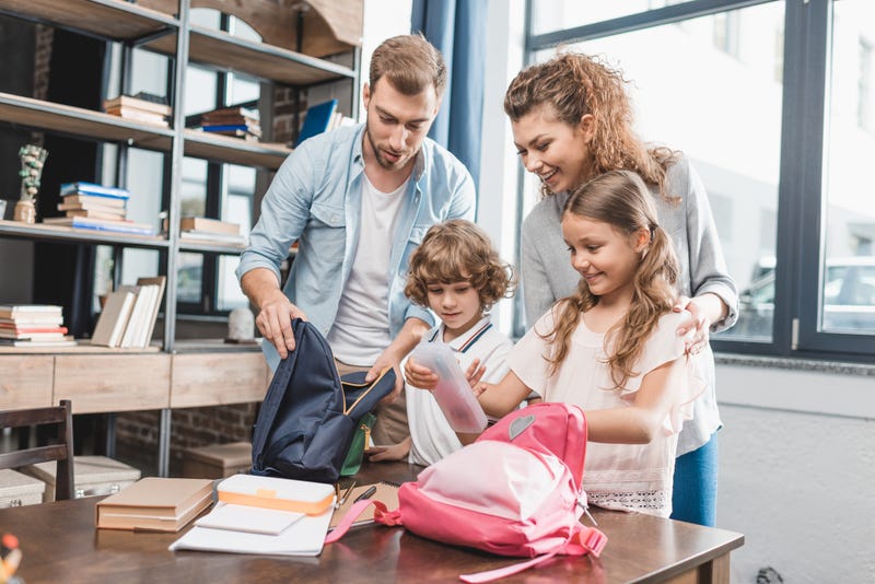 parents and their children prepare for back to school