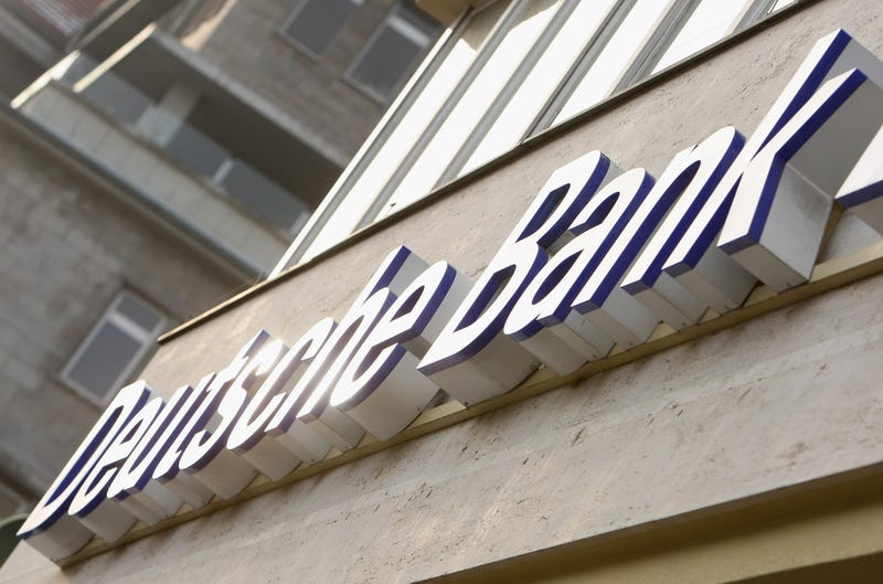 Sunlight hits the logo of Deutsche Bank, Germany's biggest commercial bank, at a bank branch on January 14, 2009 in Berlin, Germany.