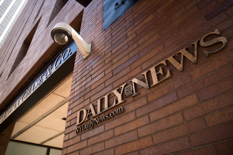 Signage for the New York Daily News is displayed on the facade of their Broad Street office, September 5, 2017 in New York City. Alden Global Capital let the lease on the building lapse during the pandemic.