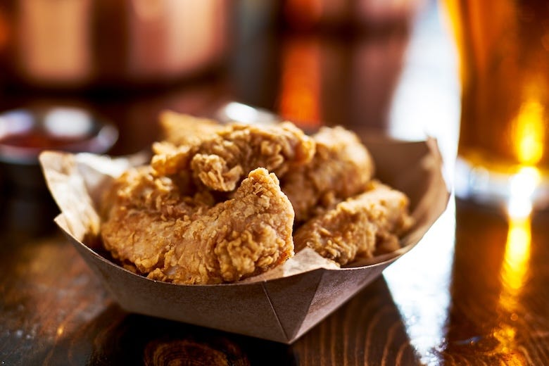 Basket of chicken tenders on a table
