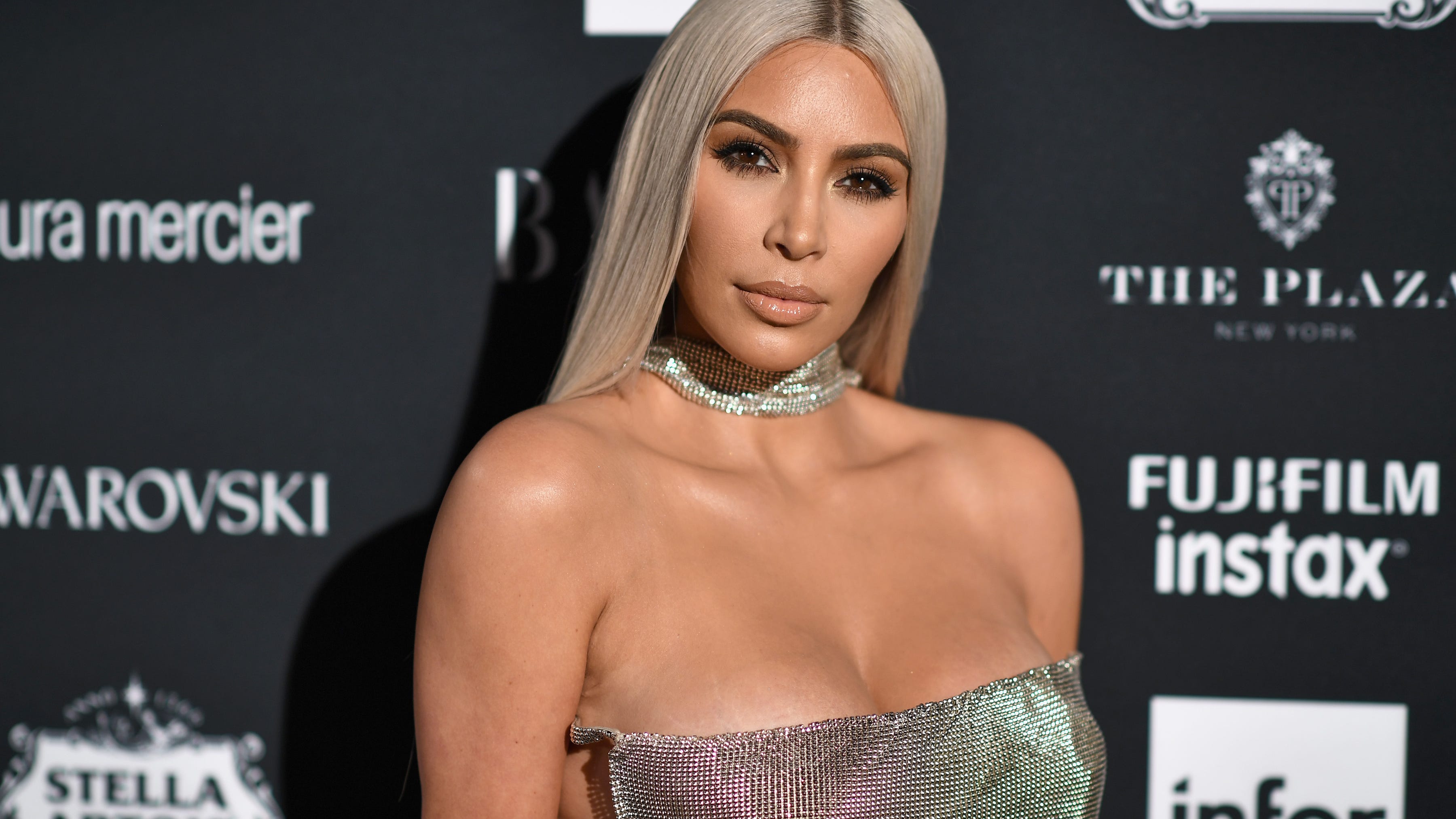 Kim Kardashian rocks short shorts with extra big boots