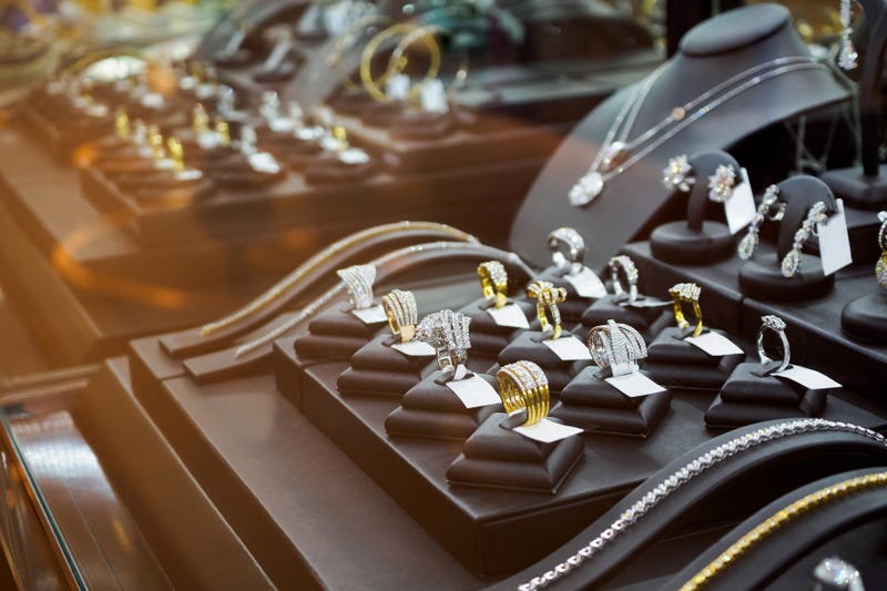 One man was taken into custody on Wednesday after deputies claim he grabbed two diamond rings out of the hands of jewelry store clerk while inside a Downriver department store and took off.