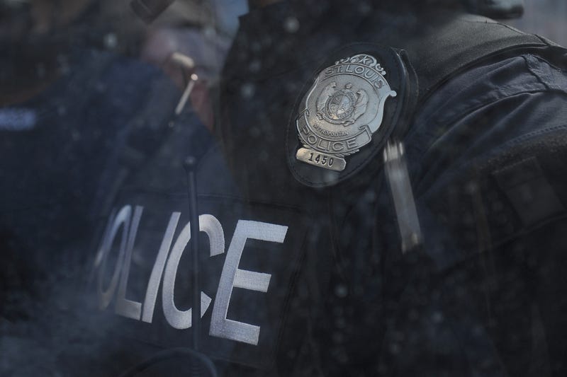 ST. LOUIS, MO - SEPTEMBER 15: Police in riot gear stand by as protestors demonstrate following a not guilty verdict on September 15, 2017 in St. Louis, Missouri. Protests erupted today following the acquittal of former St. Louis police officer Jason Stockley, who was charged with first-degree murder last year in the shooting death of motorist Anthony Lamar Smith in 2011.