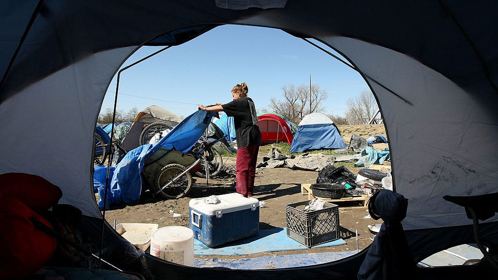 Apple clears homeless encampment from its property