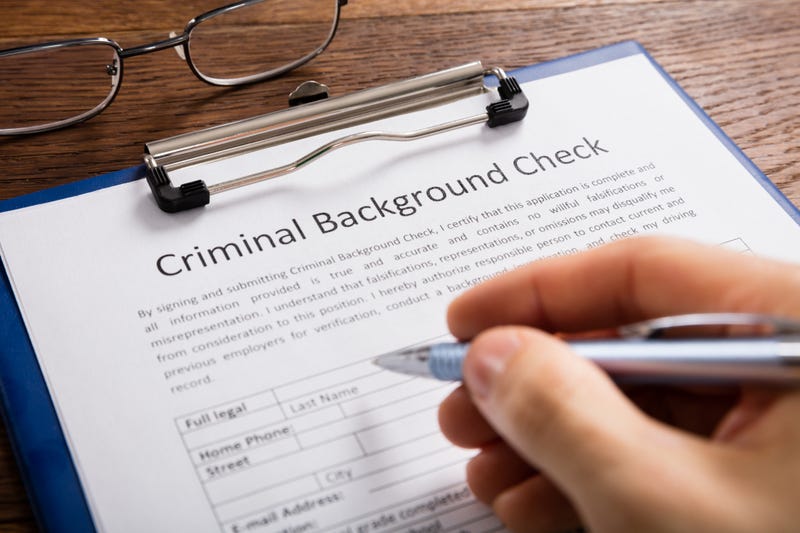 Person filling out criminal background check
