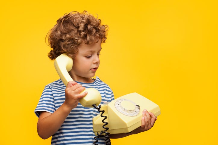 child with a phone