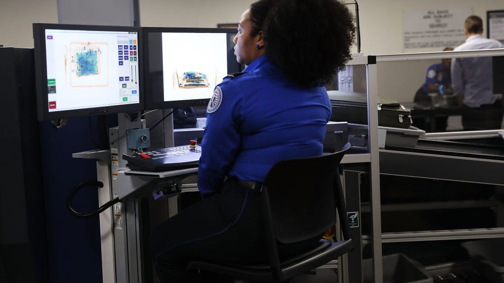TSA confiscated a record number of firearms at airports in 2021