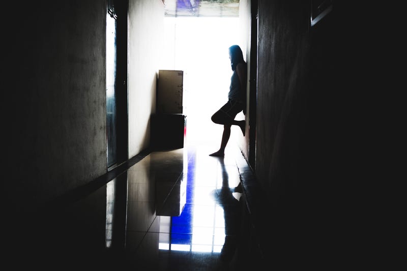 A victim of human trafficking.
