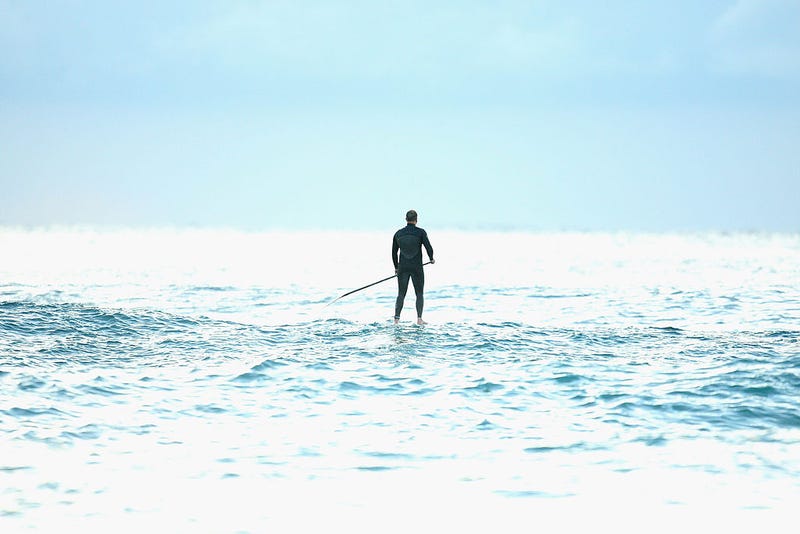Paul Hawkins waits for swell on his paddleboard at Queenscliff Beach on May 1, 2009 in Sydney, Australia.