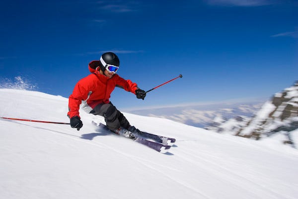 Man skiing down a slope