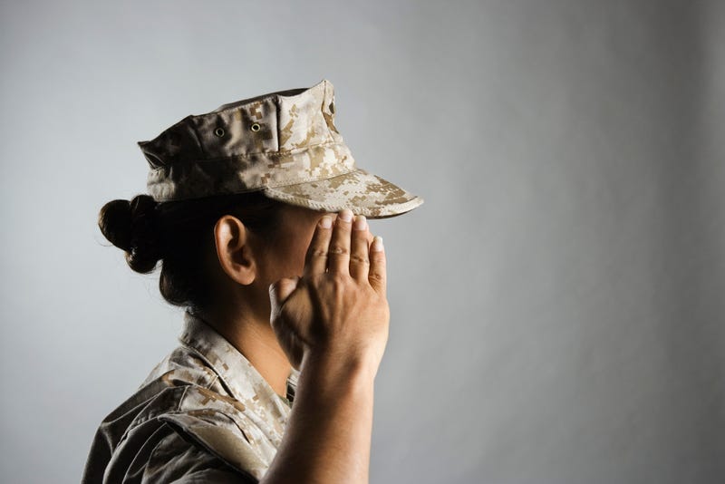 A female soldier in profile.