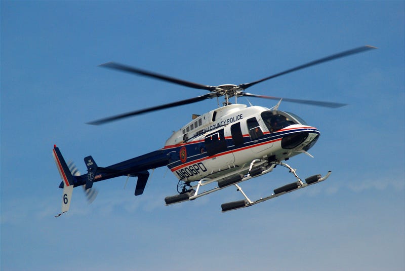 A Nassau County Police Helicopter patrols from the air over Jones Beach in Wantagh, New York.