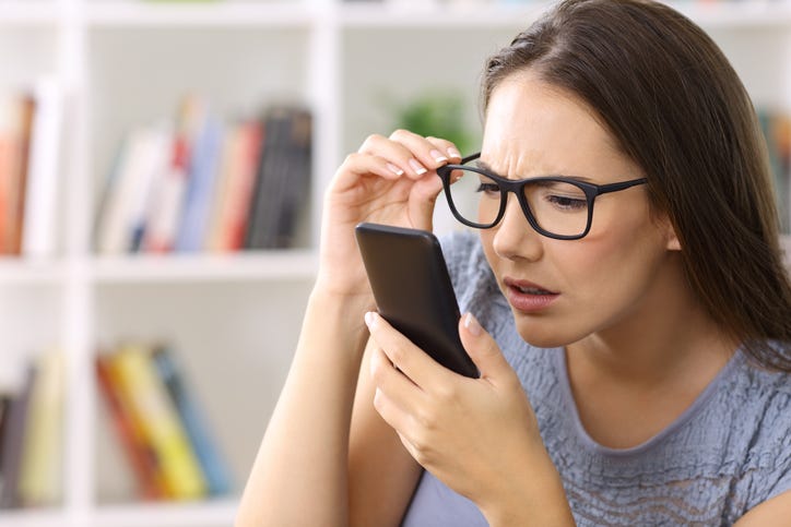 Girl Reading Phone Text