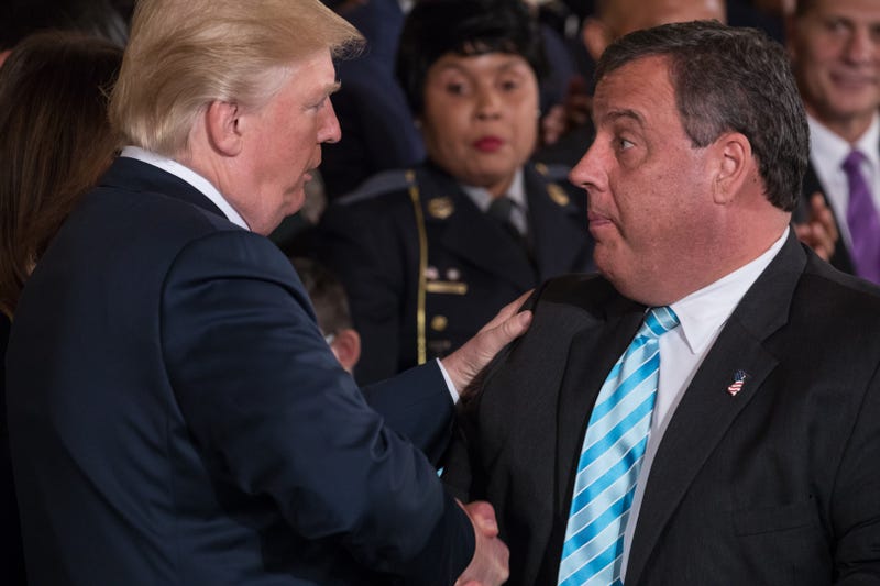 President Donald Trump shakes hands with Chris Christie, governor of New Jersey, after he signed the presidential memorandum addressing the opioid crisis, in the East Room of the White House, on Thursday October 26th, 2017.