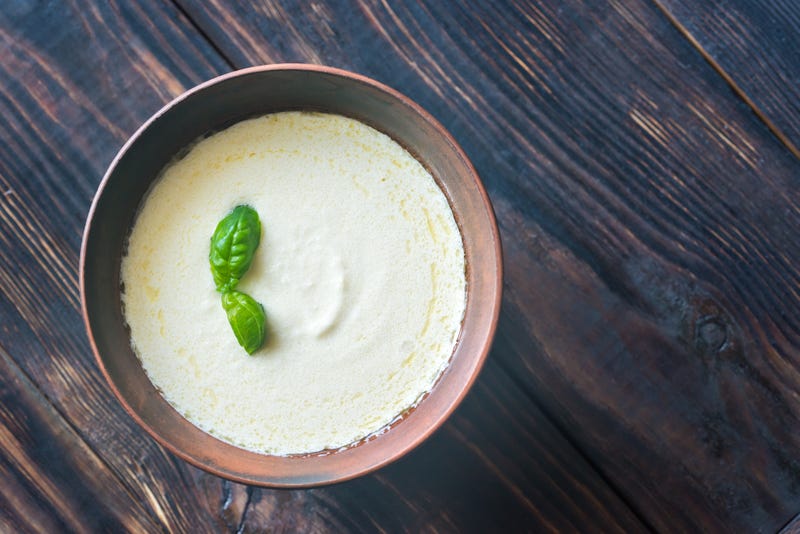 a bowl of Alfredo sauce. 
