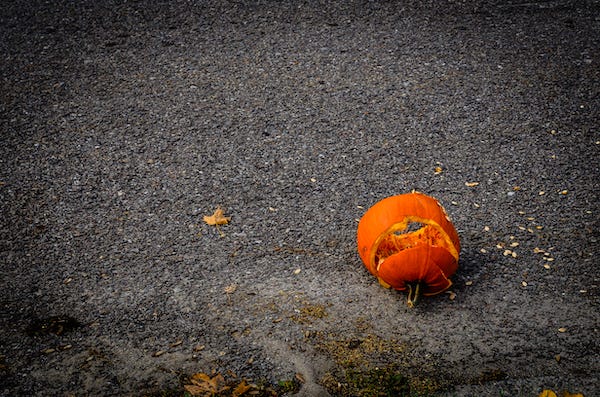 Smashed pumpkin on the pavement
