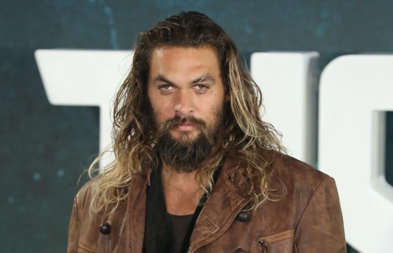 Actor Jason Momoa attends the 'Justice League' photocall at The College