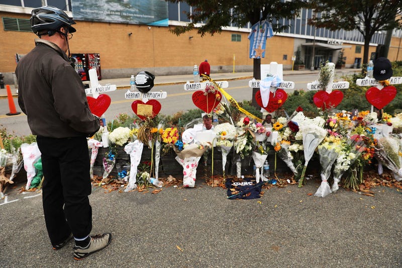 Mark Hennen looks at the eight crosses marking the location where terrorist Sayfullo Saipov entered a Manhattan bike path and went on a rampage with a truck last Tuesday afternoon on November 7, 2017 in New York City.