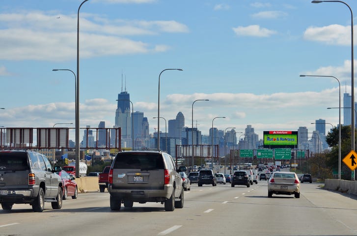 Driving on the Highway I-90 Kennedy Express to Downtown Chicago.