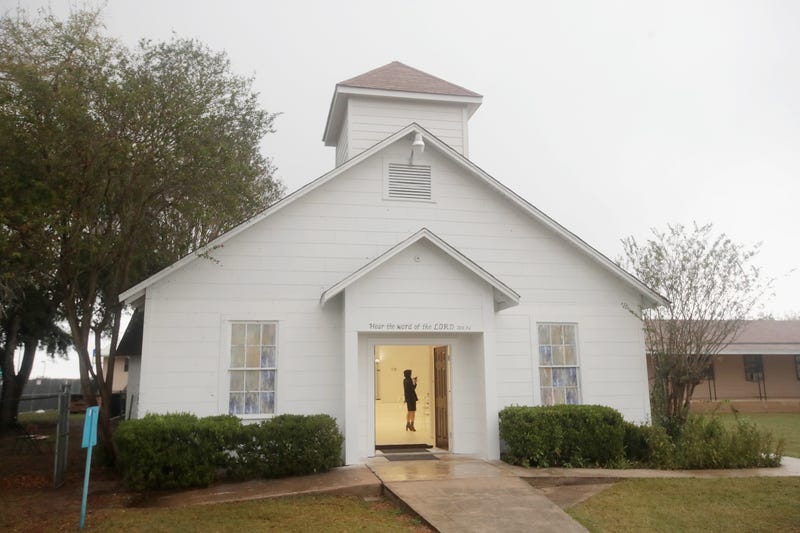 Members of the news media tour the First Baptist Church of Sutherland Springs which has been turned into a memorial to honor those who died on November 12, 2017, in Sutherland Springs, Texas.