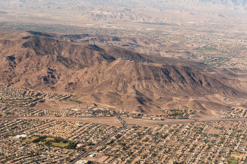Aerial view of Southeastern Henderson Nevada, I-515 lies at the base of the hill