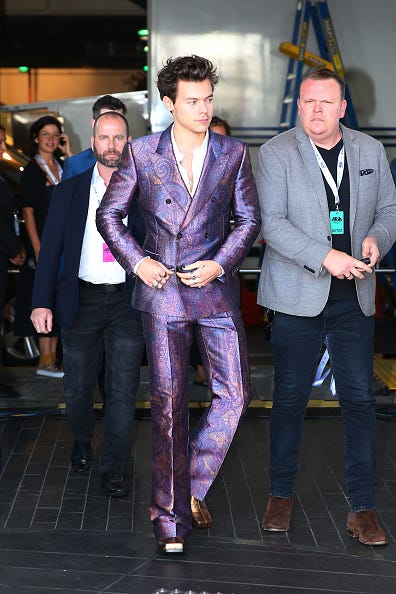 harry styles in purple suit