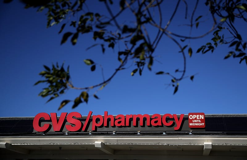 A sign is posted on the exterior of a CVS Pharmacy on December 4, 2017 in San Anselmo, California.