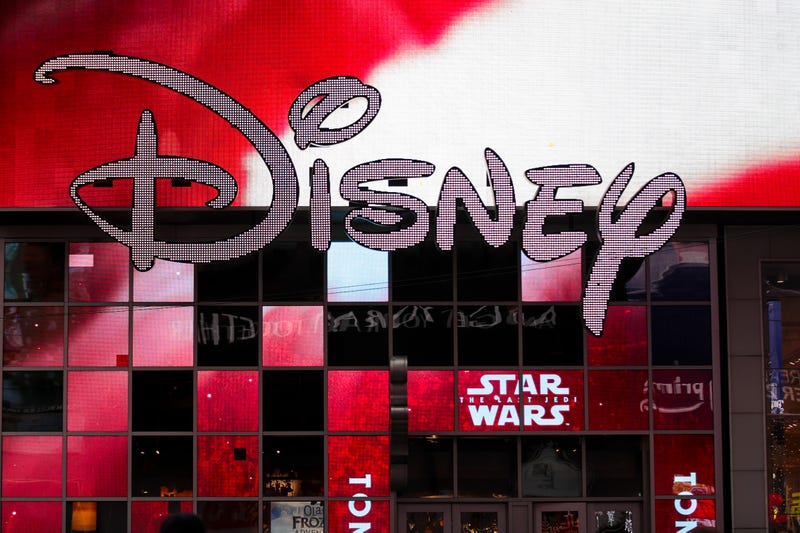 The Disney logo is displayed outside the Disney Store in Times Square, December 14, 2017 in New York City. 