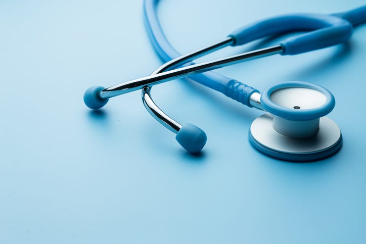 Stethoscope on a blue background.