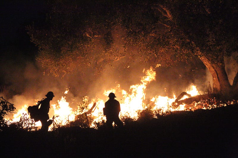 firefighters battle wildfire