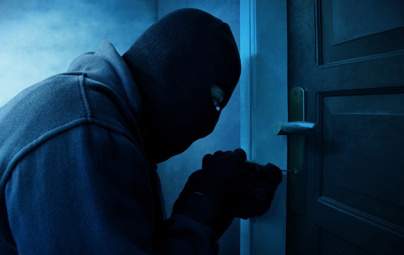 Thief picking a lock