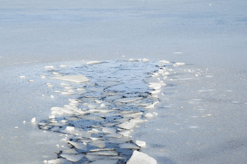 Ice on a lake where someone fell through.